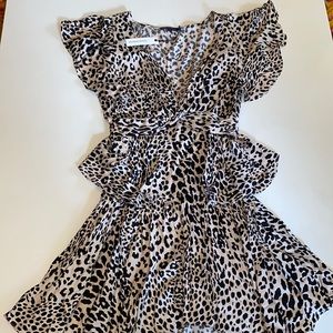 NWT adorable animal print dress. Size Large. V-neck, flutter sleeves mini dress.